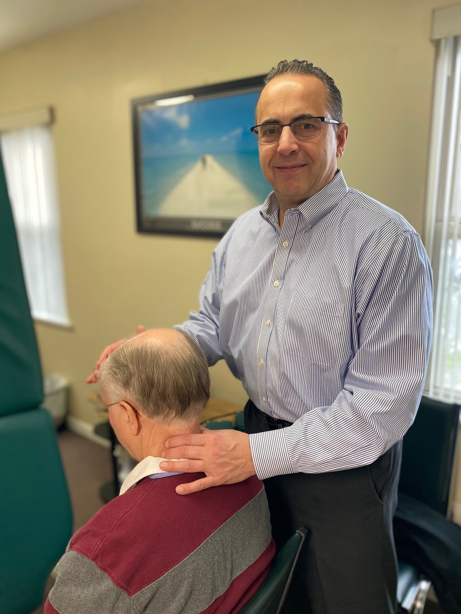 Dr. Mark Augello providing a chiropractic adjustment at his Bethlehem PA practice